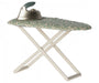 Iron and green floral ironing board