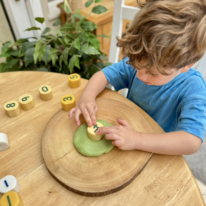 Number Stamping Stones - Play Dough Math Stamping Stones