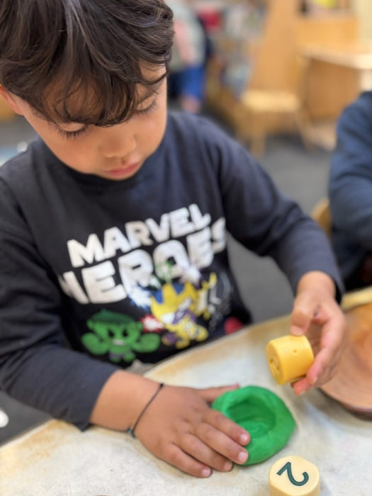 Number Stamping Stones - Play Dough Math Stamping Stones