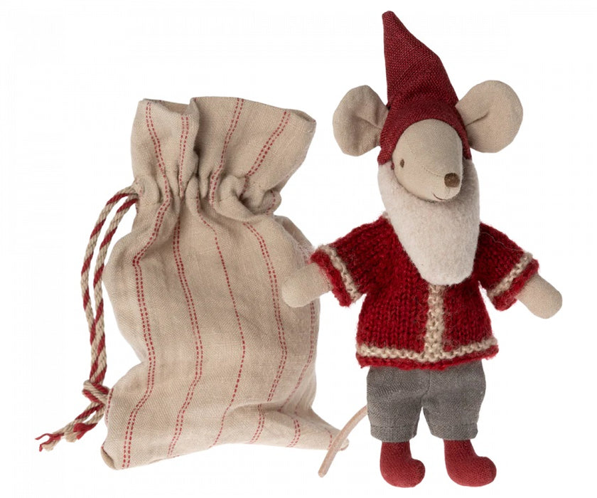 Santa mouse with a sack and gingerbread house