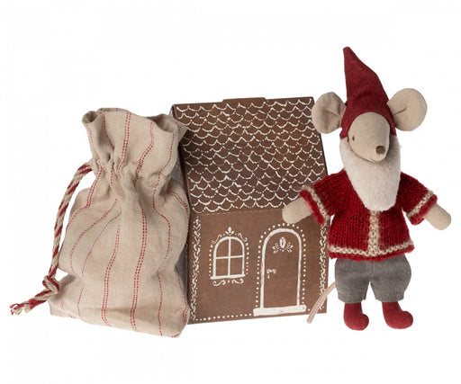 Santa mouse with a sack and gingerbread house