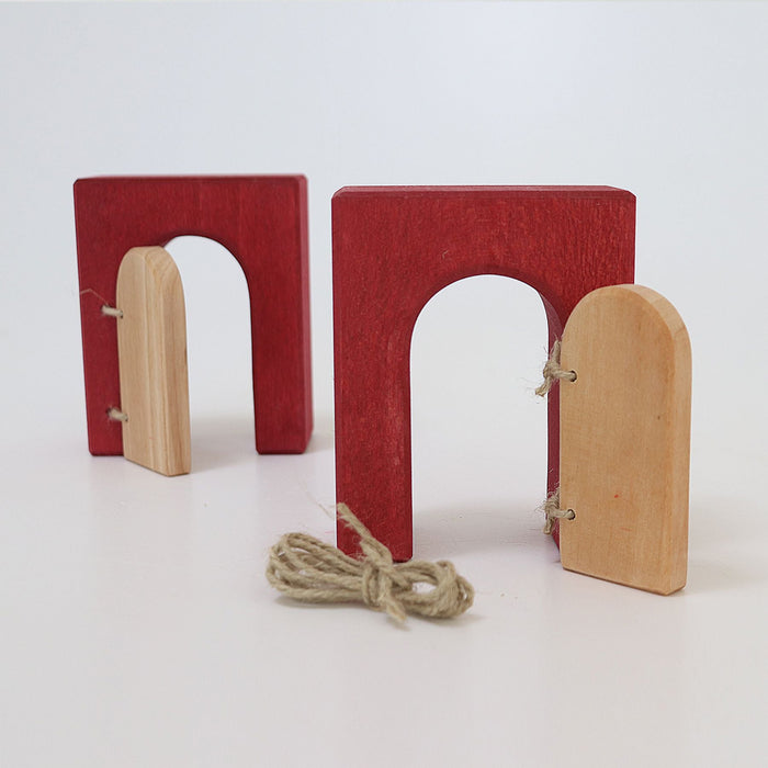 Door made using twine through the holes in arches and blocks, Building World Desert Sand  - Grimm's Wooden Toys