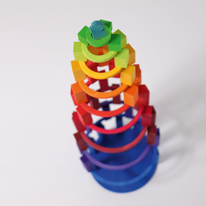 a tower built using one circle as the base and consecutive rings, with the use of tiny blocks