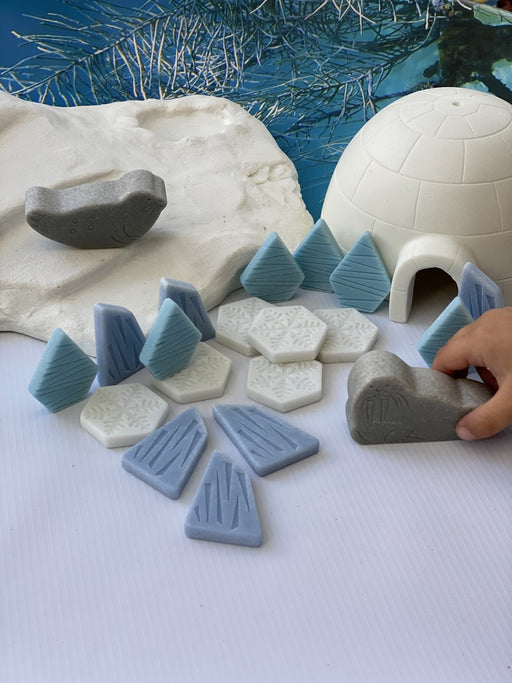 Polar Play Sensory stones during play in an arctic setting