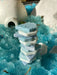 A lovely stack of Polar Play sensory stones placed in crushed ice