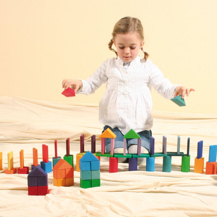 Child playing with Shapes and Colors - Grimm's Wooden Toys