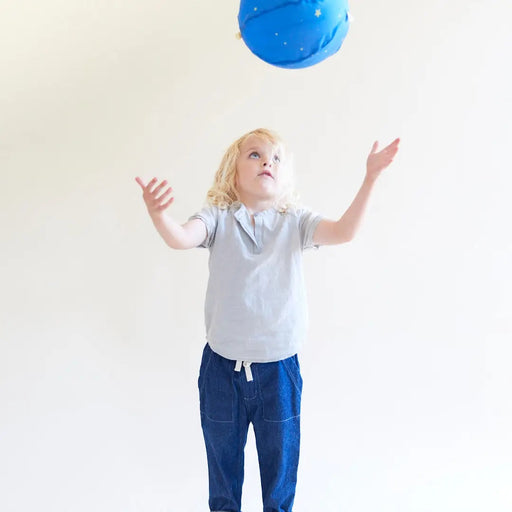 A child playing with Star Balloon Ball - Sarah's Silks