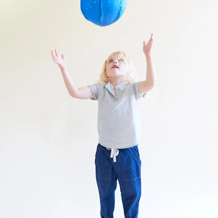 A child playing with Star Balloon Ball - Sarah's Silks