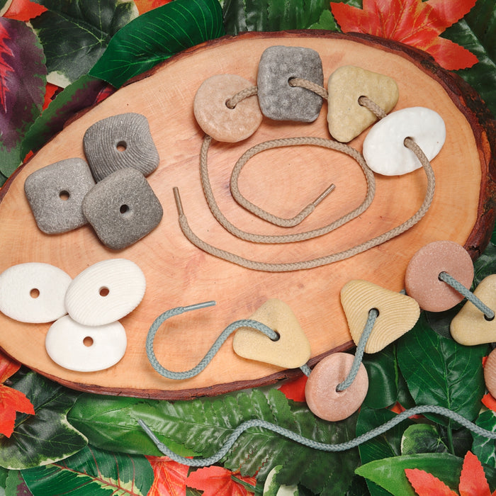 Textured Threading Pebbles – Fine Motor Lacing Stones