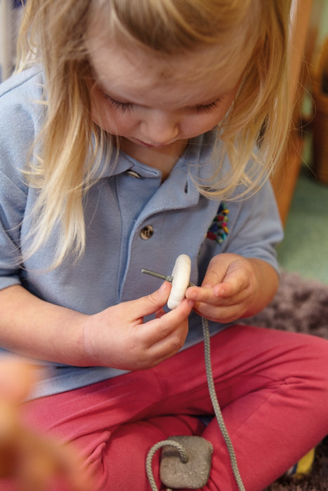 Textured Threading Pebbles – Fine Motor Lacing Stones
