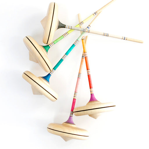 long skinning wooden toy spinning top with rainbow stripes painted on its handle